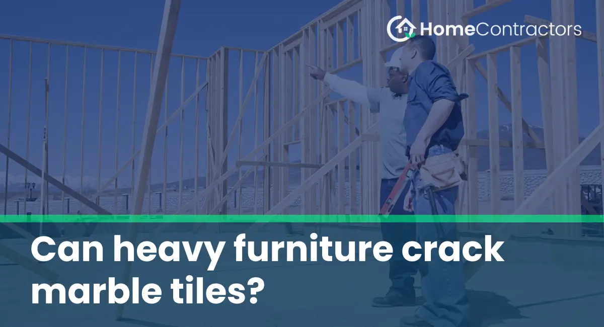 Can heavy furniture crack marble tiles?